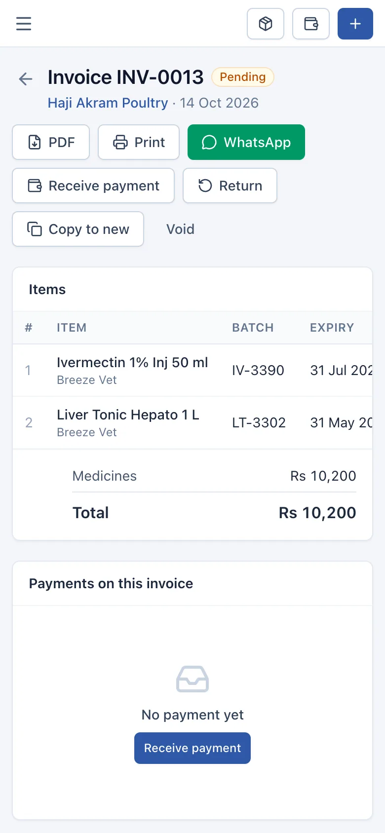 An invoice on the phone with PDF, Print and WhatsApp buttons